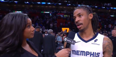 Grizzlies star Ja Morant talks to TNT sideline reporter Taylor Rooks after hitting game-winning shot vs. Miami Heat.